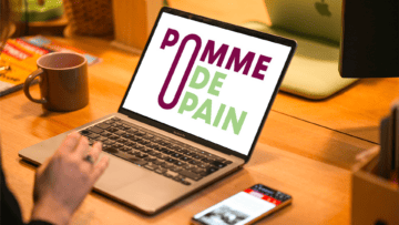 Le logo Pomme de Pain sur un écran d'ordinateur, pour illustrer la brève sur le rachat de l'enseigne.